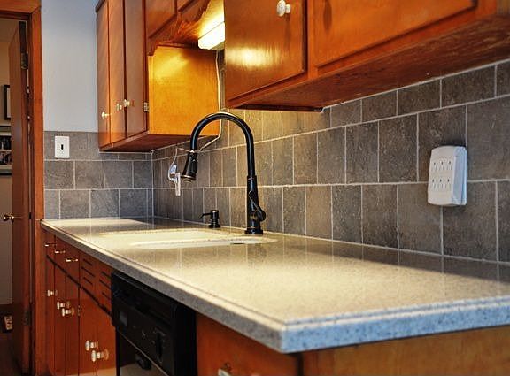 With beautiful Corian Counter...