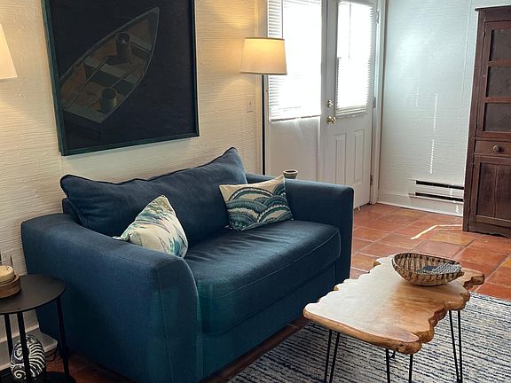 Great room west side of room. Not furnished at this time.!Bring your own to enjoy this eclectic apartment.