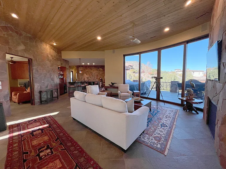 Living Room with Office Entry on the Left and Dining Area Beyond