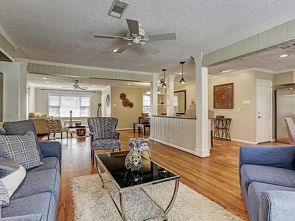 The Living room is Spacious, the Family room is by the Kitchen and you can see the Dining Area is ready for Family Get togethers