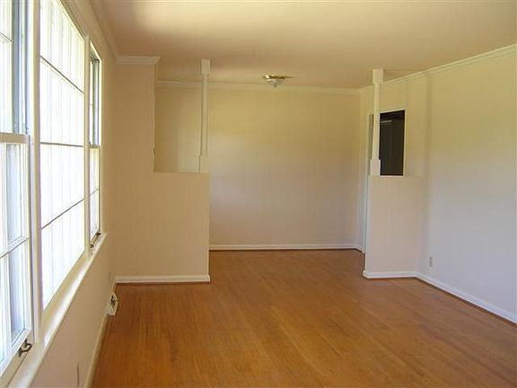 Entry & living room with hardwood floors.