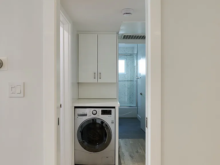 Mini Laundry Room between the Mater and Guest Bedroom