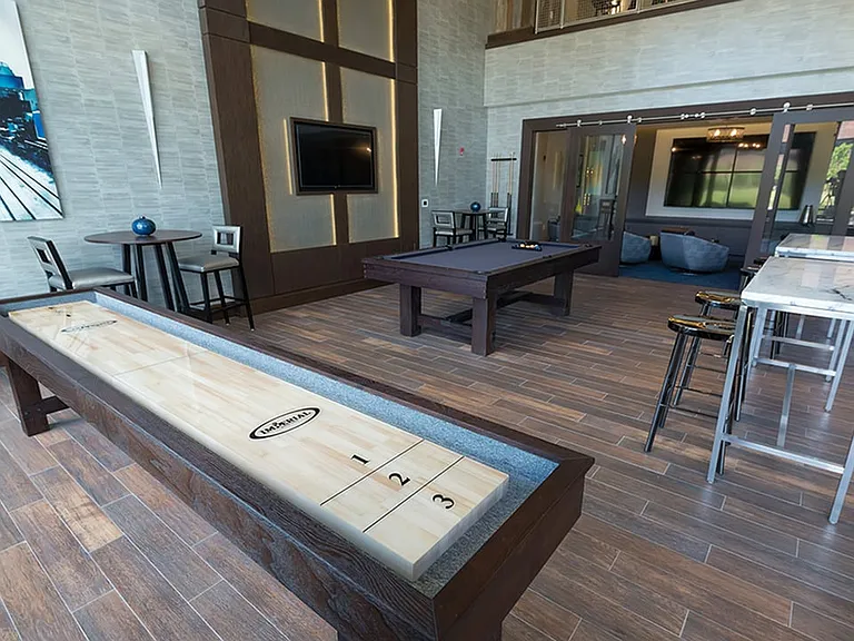 Challenge your friends to a game of shuffleboard or pool