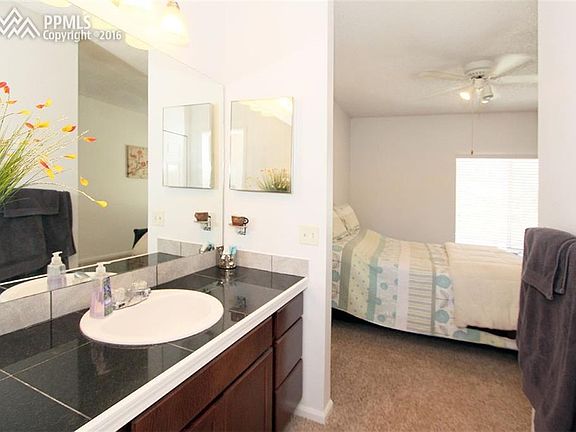 Updated bath with 3/4 shower and tile counters, new lighting and a linen closet