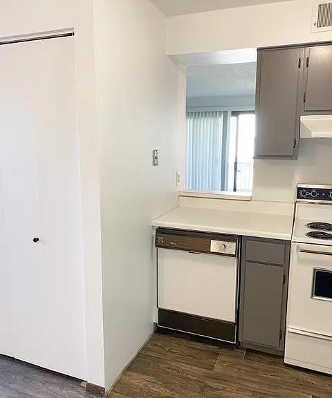 View of family room through the pass through in kitchen