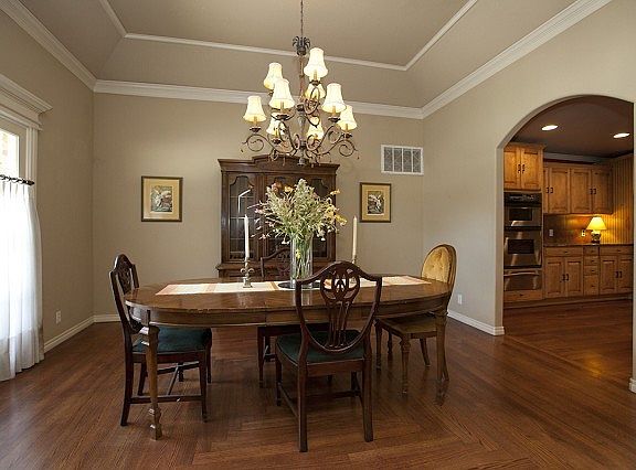 Formal dining room with tray ceiling