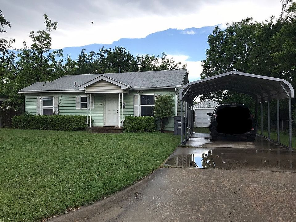 Front of house/carport