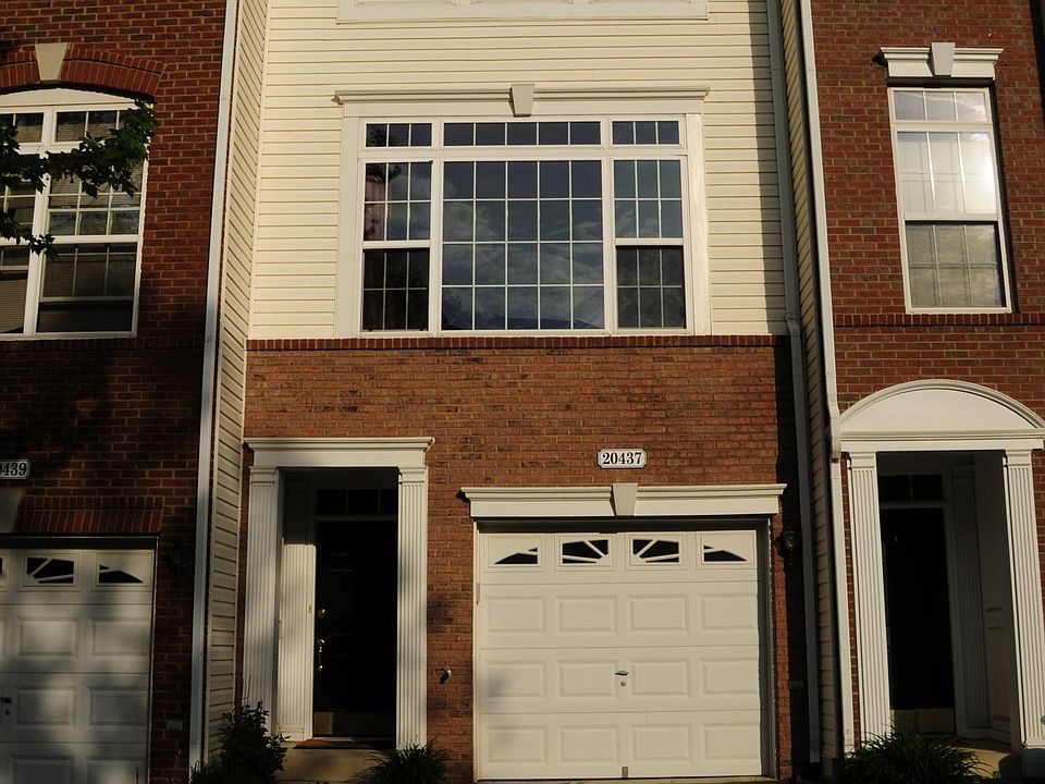 3 story townhouse, 1 car garage with driveway