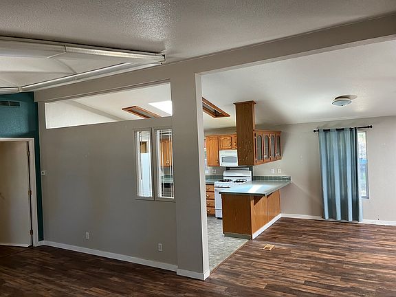 View as you enter the house, kitchen and part of both living rooms