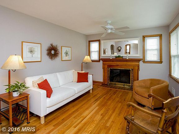 Welcoming living room with wood burning fireplace