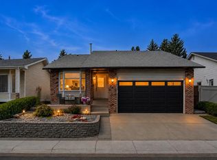 140 E Woodglen Way SW, Calgary, AB T2W 4T3