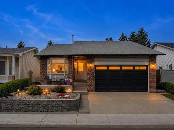 140 E Woodglen Way SW, Calgary, AB T2W 4T3