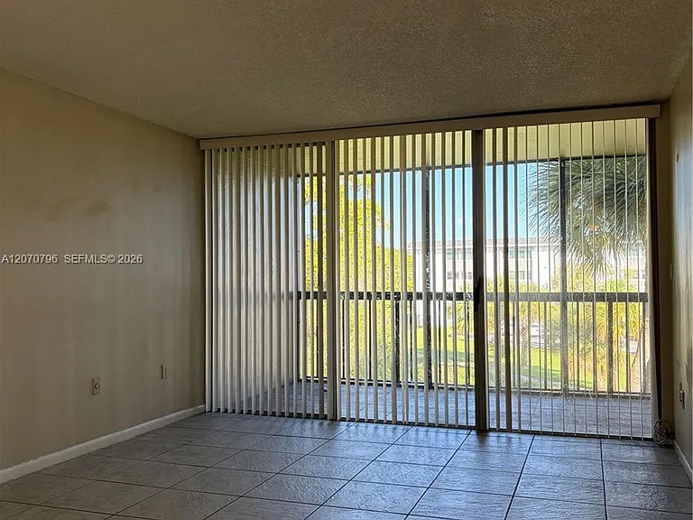 10865 SW 112th Ave #313 — Photo 1