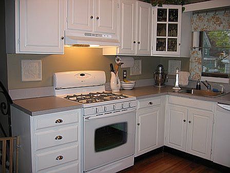 Freshly painted cabinets, new gas stove