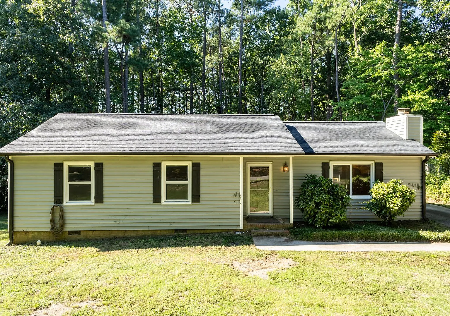 Updated 3 Bed Ranch with Fireplace & Huge Back Deck in Cary! — Photo 3