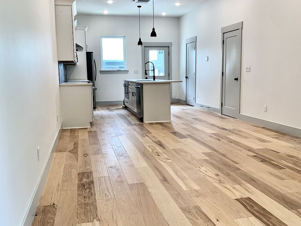 Kitchen and dining area viewed from living room area