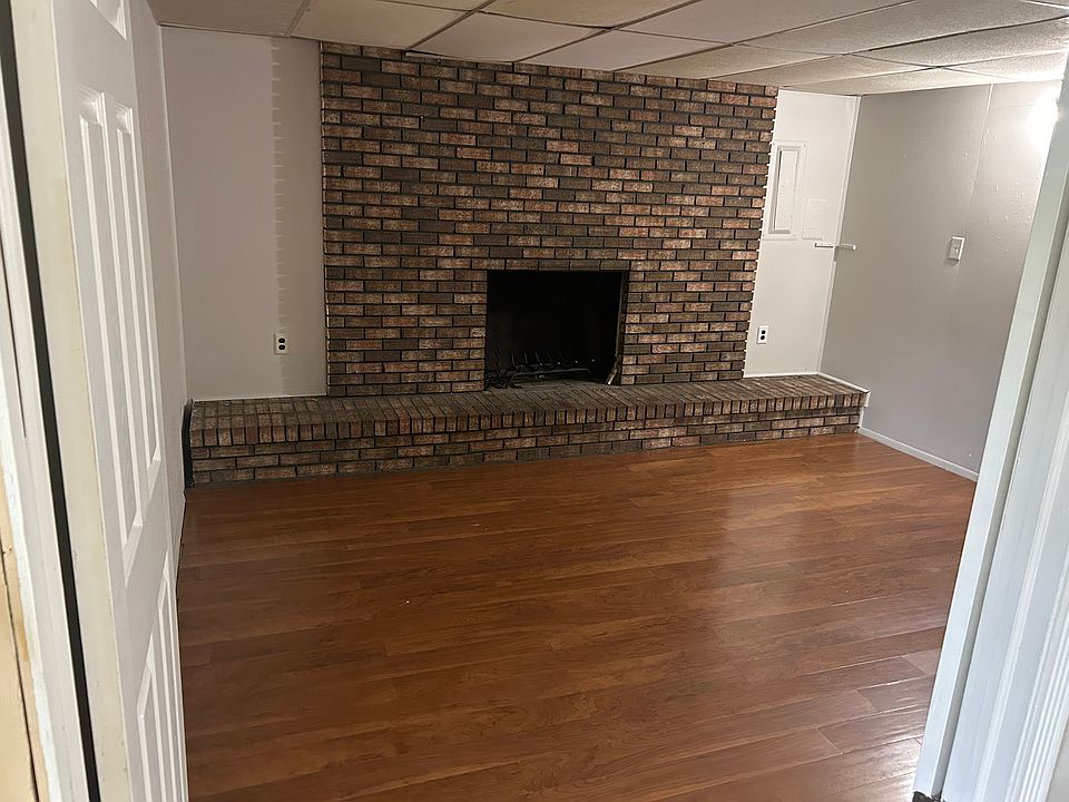 Living space - converted garage with fireplace