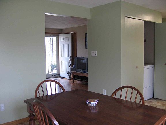 View from the dining room. Laundry room door ajar.