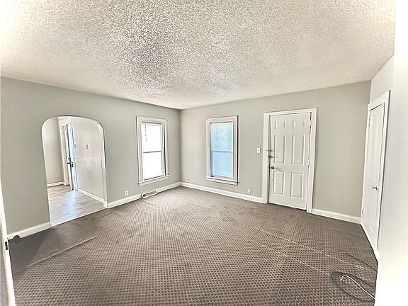 Family room with walk-in closet (right most door). Bathroom and basement (not shown here) are also attached off of the family room.