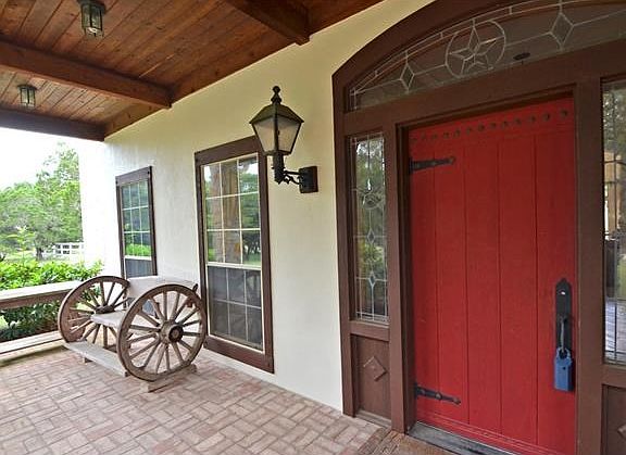 Front Door and Covered Brick Porch