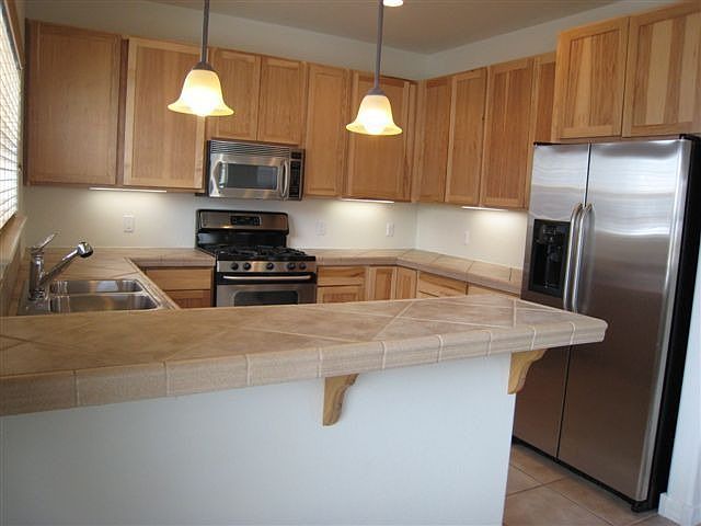 Upgraded GE Stainless Appliances with Gas Range