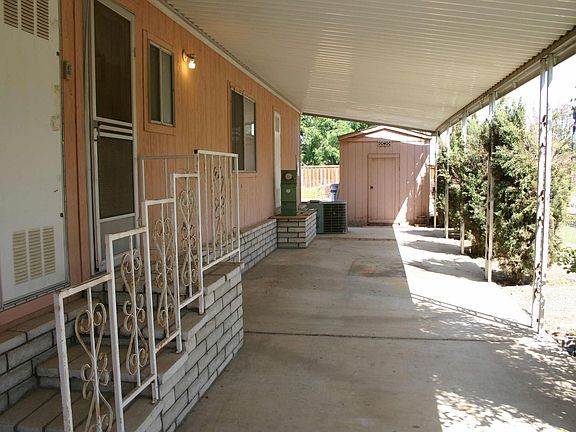 There are 2 sheds for all your storage needs, plus a carport to park several v