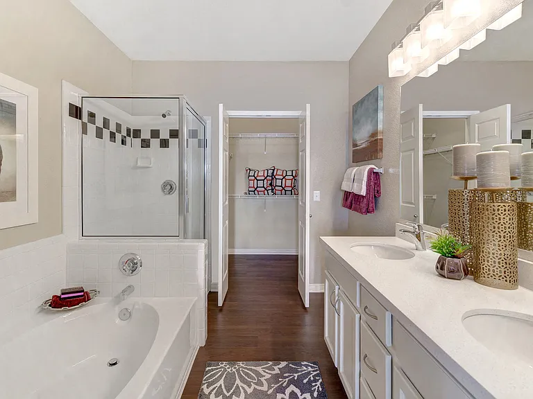Double vanities, large soaking tubs and separate showers in select homes