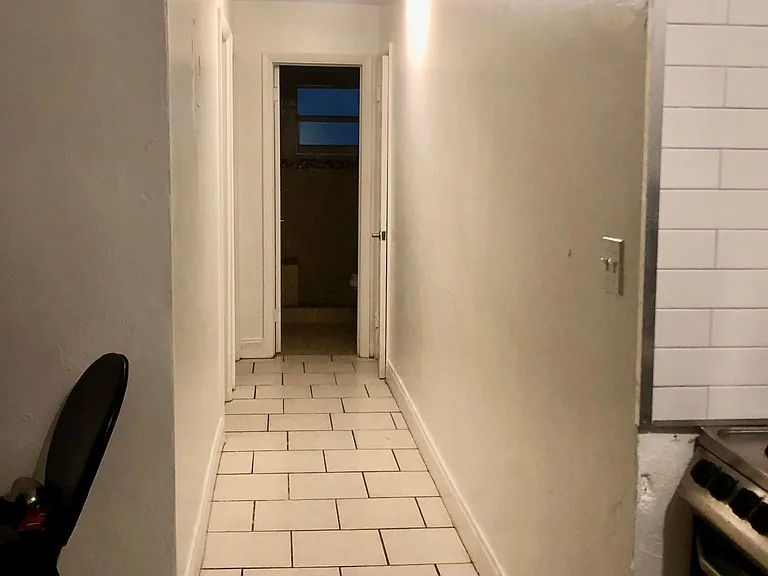 Hallway that leads to bedrooms, bathroom & utility closet