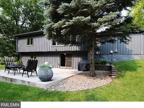Walkout to new large private patio overlooking the gorgeous wooded park with trails