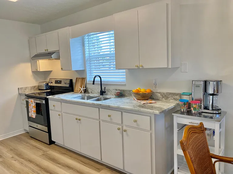 Kitchen - with granite countertops and stainless steel appliances