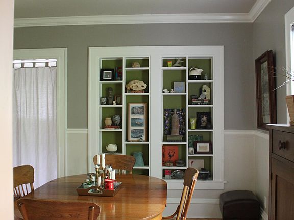 Dining room. Bedroom is behind curtain.