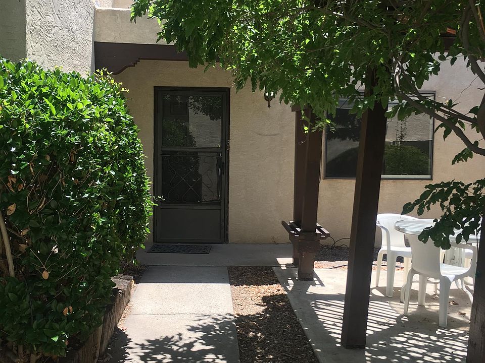 Entry with patio furniture under Wisteria gazebo...