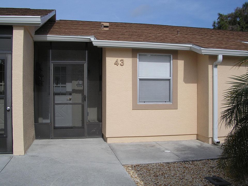 Front of Condo with small enclosurer