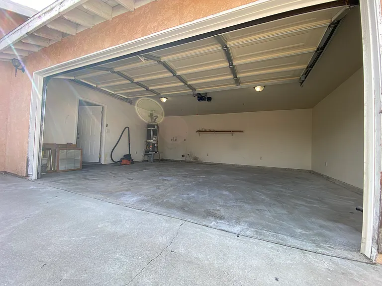 2 car garage with washer/dryer hook ups.
