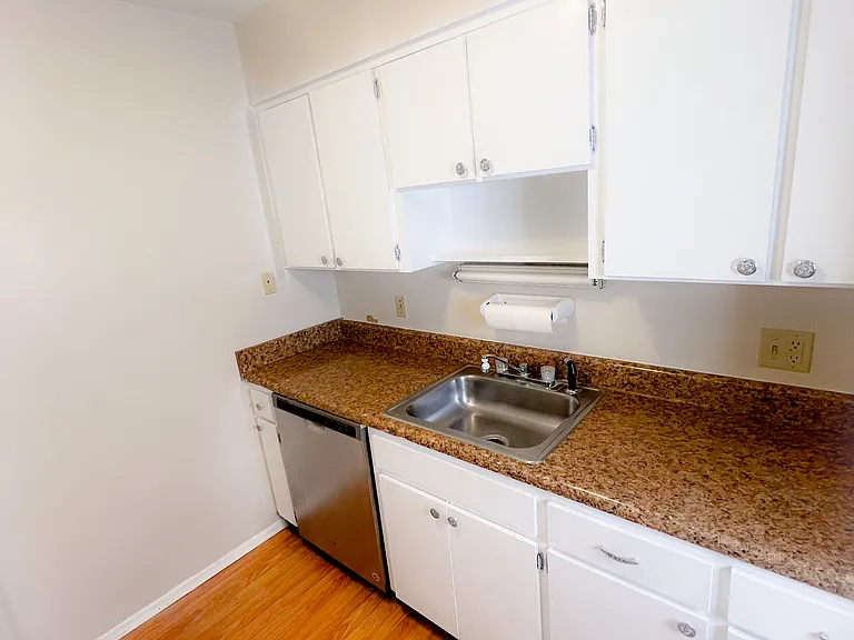 Unit is unfurnished and photos are staged. Furniture not included.