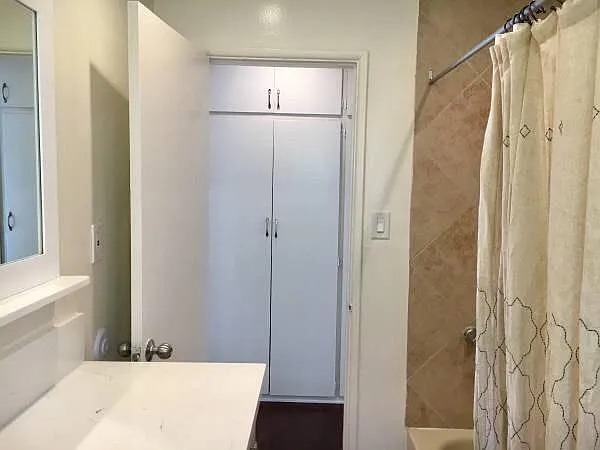 tub / shower. hallway closets for extra storage.