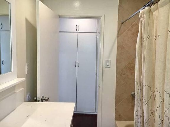 tub / shower. hallway closets for extra storage.