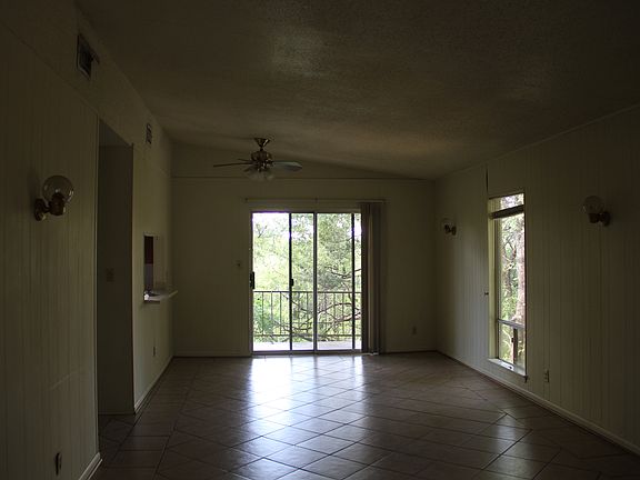 from front door across living room to 2nd floor deck