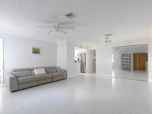 View from entrance and living room, toward kitchen.