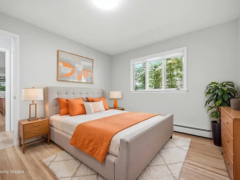 Secondary bedroom, with two double closets. Virtual staging option 2