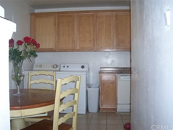 Second view of L shaped kitchen.