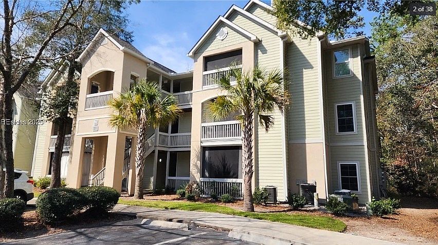 Exterior of condo entrance (condo in rear overlooking woods)