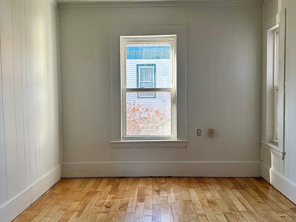 Bedroom with newly refinished original maple floors