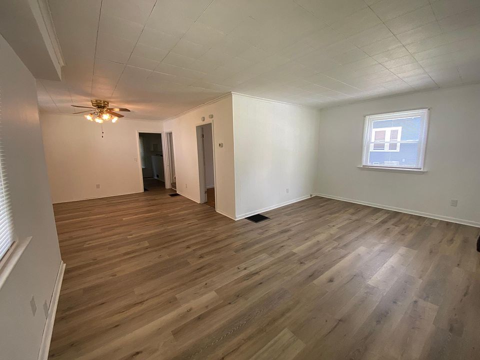 Entry way view of living room, dining room