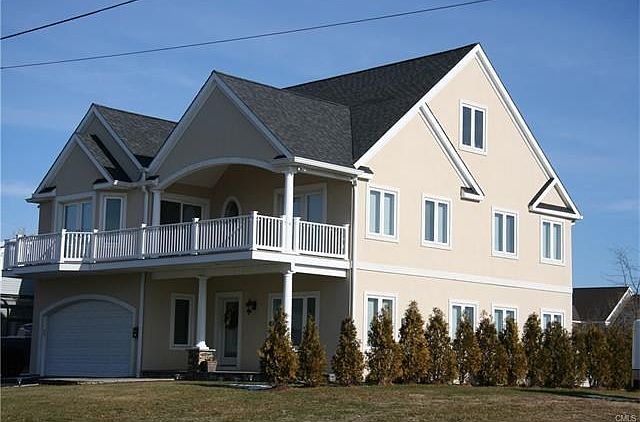 Lordship colonial with water views and high quality finishes.