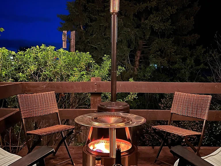 Side patio wood deck. Super cozy, serene, and private