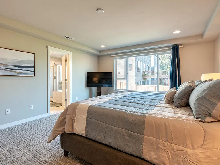 Another view of the Spacious Primary Bedroom with King Bed