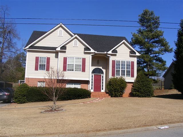 Split Foyer with Vinyl Siding and Brick