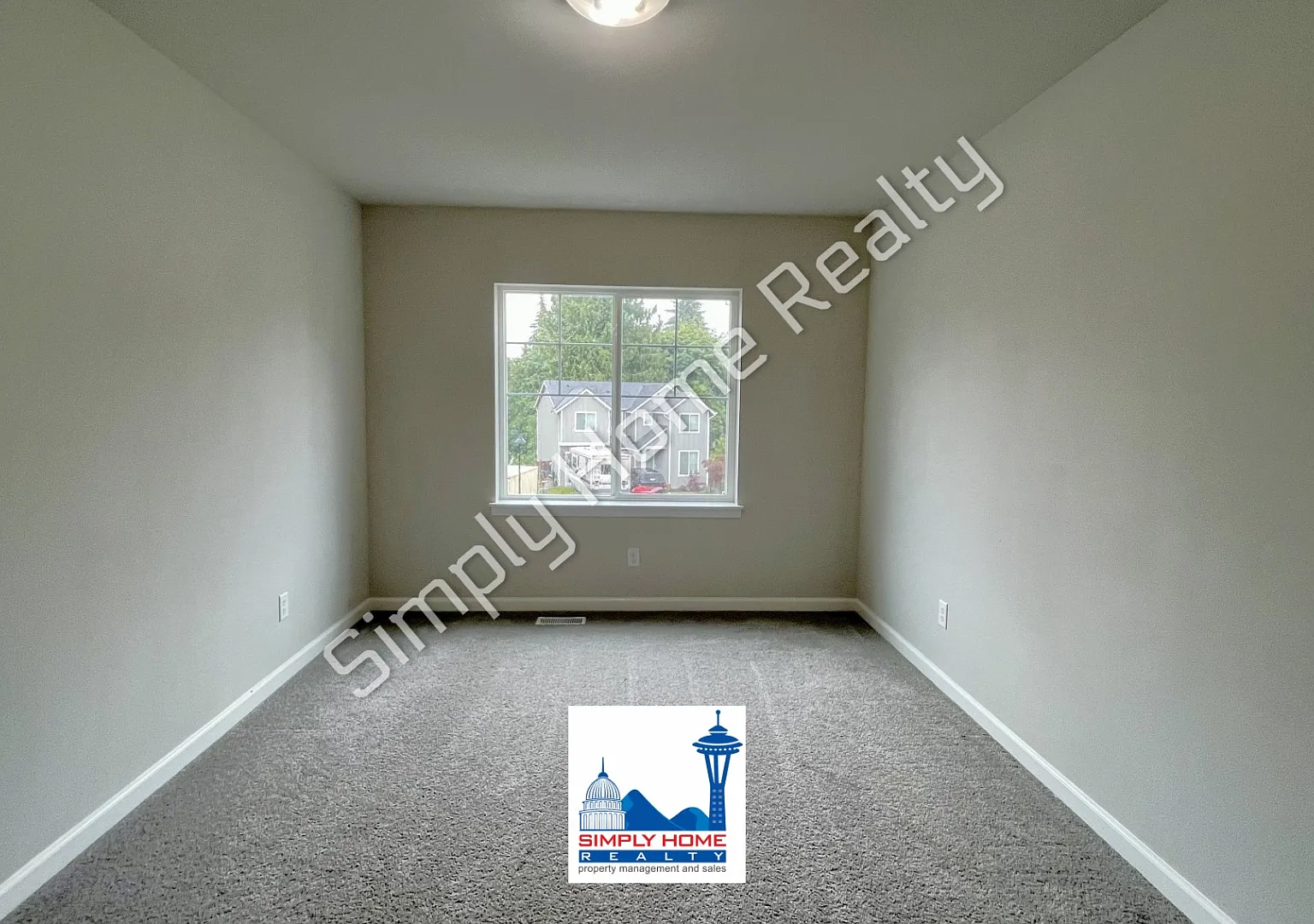 Step Inside to this Home with Spacious & Flexible Living! — Photo 2