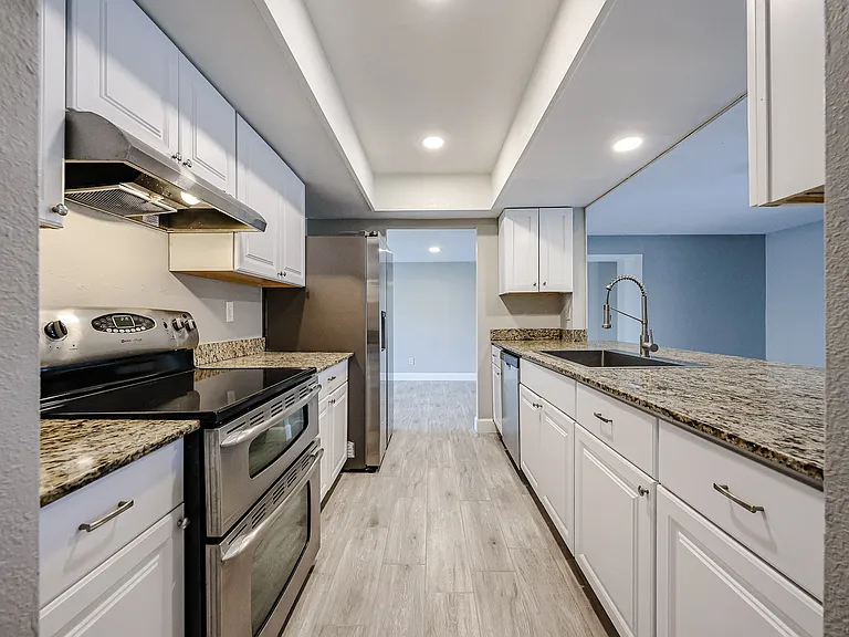 Granite Countertops and stainless appliances.